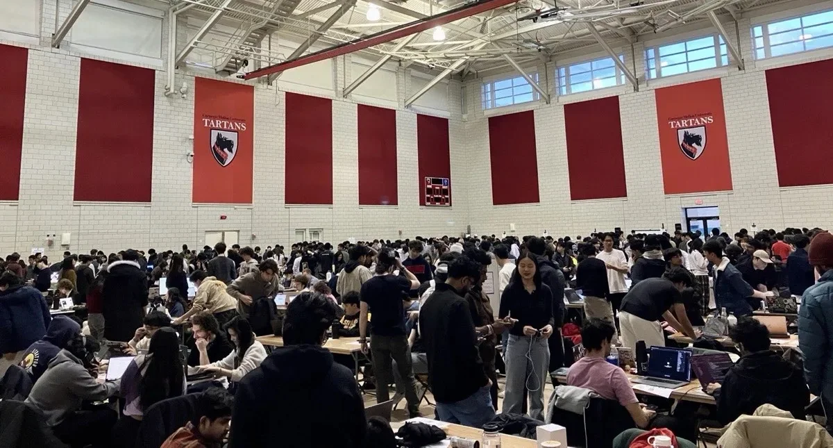Teams presenting projects at the TartanHacks judging expo